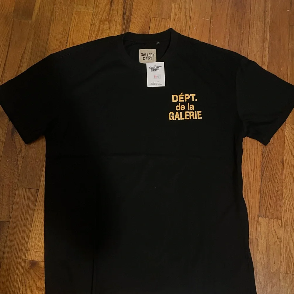 Gallery Dept Black Tee with Yellow Print - Picture 1 of 5